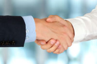image of handshake representing reliability & trust - grandstream india
